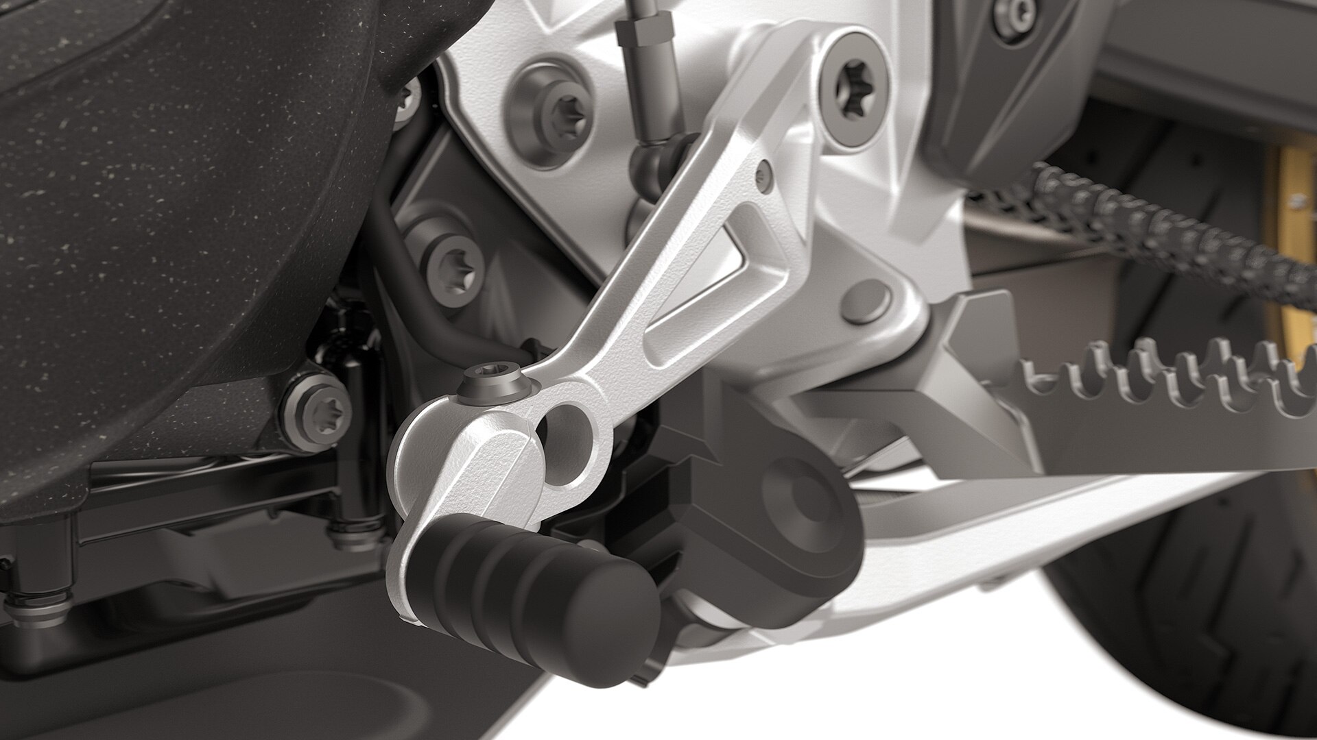 Nastavljiva nožna prestavna ročica in ročica zavore serijsko spadata k modelu F 900 GS znamke BMW Motorrad